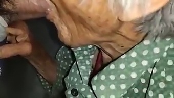 Elderly Chinese Woman Indulges In Youthful Desires