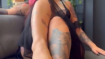 A Sexually Aroused Inked Girl Displaying Her Physique